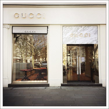The closed Gucci shop on the Kurfuerstendamm.  The Berliner Ku'damm is lined with luxury boutiques, hotels and restaurants. The coronavirus has resulted in deserted pavements and most of the shops are...