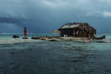 The hut of fisherman Tony Castro Perez on Sichirdub Island, or Ant island, in the San Blas archipelago, where he spends three months a year fishing with his six children. Destructive tidal surges and...