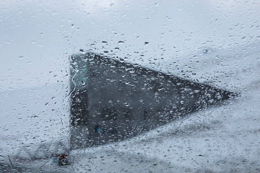 Rain hits the Global Seed Vault during the Arctic winter, on the outskirts of Longyearbyen, the northernmost city on the planet.  However, the temperature at + 3Â�C is far above the - 20Â�C which i...