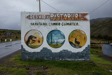 A sign on the 'climate change route' indicates the route that leads to the Pastoruri Glacier in the Huascaran National Park.