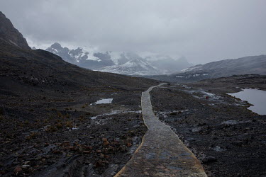 A path that leads from the Pastoruri Glacier in the Huascaran National Park. The glacier is shrinking rapidly having lost half of its surface area since 1995.