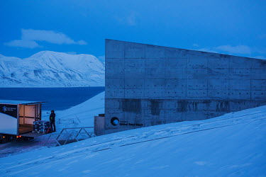 Workers from the Nordic Genetic Resource Centre (NordGen) unloads seed samples for storage in the Global Seed Vault where, in recent years, the main tunnel has experienced some flooding due to permafr...