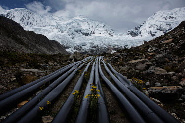Pipes used to siphon and drain water from Lake Palcacocha in the Cordillera Blanca mountain range. Due to the increased volume of water, originating from melting glaciers around the lake, avalanches h...