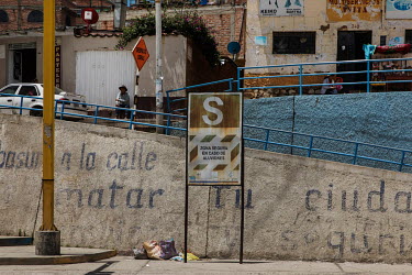 A sign indicates safe place to gather in in the event of a mudslide in the city of Huaraz, which is located on the slopes of the Cordillera Blanca. Melting glaciers have created high water levels in m...
