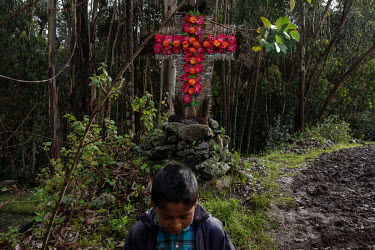 A cross made by peasants (campesinos) to protect the land, in the community of Llupa.
