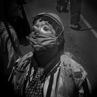 A clown, known as 'soft-shelled chick', during a protest to demand help from the state by people who have not been able to earn a living since March because of the restrictions to curb the spread of t...