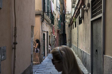 Street prostitution in the alleys of central Genoa.