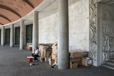 A homeless woman who lives in a cardboard shelter in a covered gallery in EUR, a residential and business district in Rome. This area was originally chosen in 1930s as the site for the 1942 world's fa...