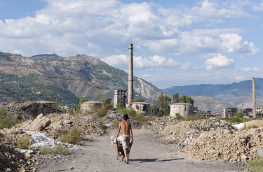 A boy collecting scrap metal from the former industrial site of Elbasan. An intensive programme of industrial development during the communist period boosted the city to 75,000 inhabitants. Today most...