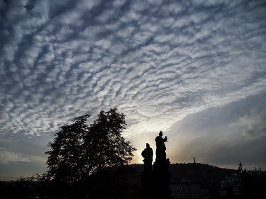 Silhouettes of sculptures on the Charles Bridge.