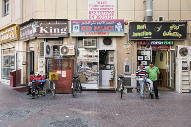 A row of small shops and restaurants in Al Fahidi.