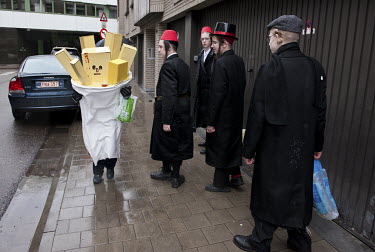 A Jewish boy disguised as a bag of chips to celebrate the festival of Purim when it is traditional to dress up.