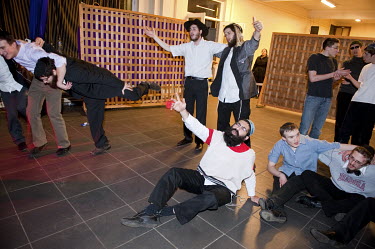Young Jewish men, some of whom have been drinking, at a party to celebrate the festival of Purim.