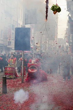 The Chinese community celebrates Chinese New Year in Chinatown, with dancing lions and dragons, and lots of fire crackers.
