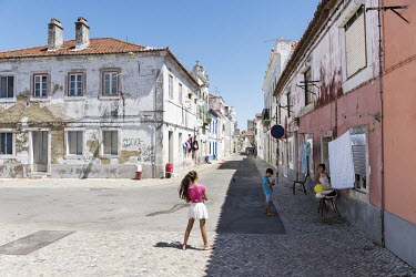 Children play on the street in a residential area of the town, a communist stronghold and the hometown of Companhia Uniao Fabril (CUF) which, from the 1930s until 1974, was one of Portugal's biggest c...