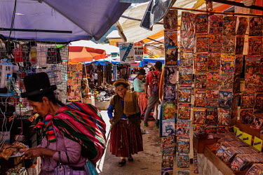 People browse the stalls in a street market in the city of Chulumani, which lies in a historic coca leaf growing region.Former President and former coca farmer Evo Morales, forced the American DEA to...