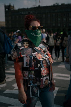 Rebeca Ledesma (34) in the Zocalo Plaza during a protest on International Women's Day. ''We come to the protest so that humanity, the country and the government become aware, but also for all our sist...