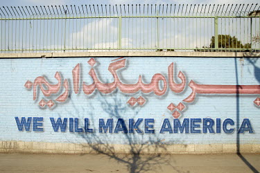 'We will make America', part of a propaganda slogan on a wall of the former US embassy (which goes on'face a severe defeat').