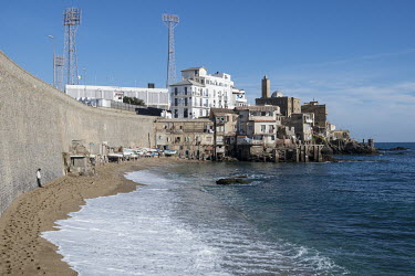 Fishermen's houses built on rocks on the Mediterranean shore front.