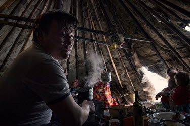 Eyko, a Nenets activist, inside his tent ('chum'). He created an internet media site called 'Golos Tundri' (Voice of the Tundra) that seeks to unite herders, fight for their rights and highlight impor...