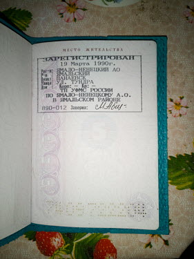 An indigenous Nenet's passport with 'Tundra' written as an address on the registration page.