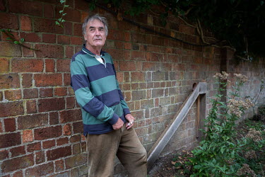 Peter Kyte stands beside a ramp built in his garden to compensate for the difference in height between his and the neighbouring property. The ramp forms part of the Kirtlington village 'Hedgehog Stree...