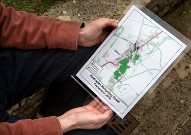 Chris Powles, the man behind the Kirtlington village 'Hedgehog Street', one a of many man-made routes built so the animals can negotiate human areas, suveys the map of the network.