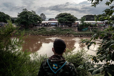 Soldiers from the Thai army's 4th Infantry Regiment patrol along the border with Myanmar looking out across the Moei River for illegal migrants crossing into Thailand amid a spike in COVID-19 cases in...