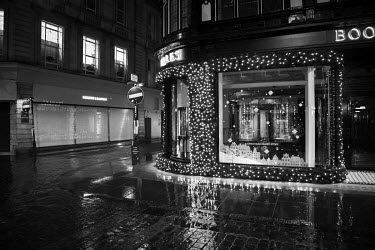 Boodles jewellery shop's Christmas display shines through the gloom on a rainy Saturday evening towards the end of the UK's second national lockdown.