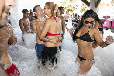 A foam party in a club on Bitez Beach where most of the tourists are Turks who live in western Europe.