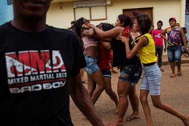 A fight between women after a party held on the Belo Monte construction workers day off.