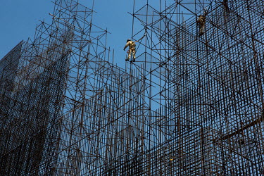 Workers assembla the steel structure of the Belo Monte hydroelectric dam's main power plant on the Xingu River.