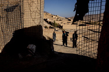 Police officers in a bunker on the frontline where they are regularly attacked by Taliban militants.