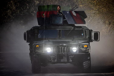 An armored military vehicle on patrol near the frontline. The Taliban are just three km away and they regularly attack.