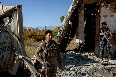 Police and special forces at a heavily damaged security post near the frontline. The Taliban are just three km away and they regularly attack.