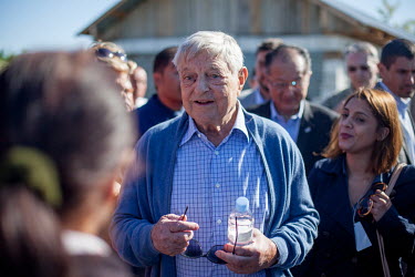 George Soros, founder and chair of the Open Society Foundation, visiting a small Roma village on the outskirts of Bucharest where the Open Society Foundation is one of the donors to a project working...