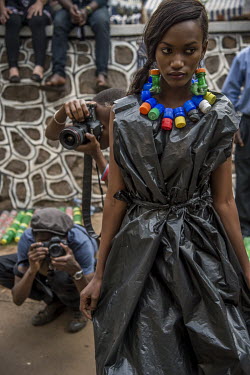 A model at the Trash on Fashion Show, part of the Bayimba cultural festival at the Kampala National Theatre, wearing clothes and jewellery made from waste plastic created by the Afrika Arts Kollective...