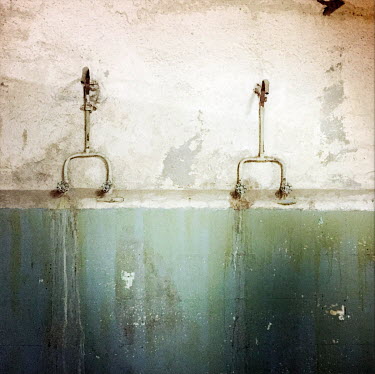 Old shower fittings at the national stadium (Estadio Nacional), which is now a memorial to political prisoners and disappeared victims of the Pinochet dictatorship.
