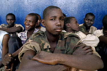 Child soldiers sit in a courtyard at the Gendarmerie School prior to being freed. They were recruited by Chadian rebels and taken prisoner by the National Chadian Army (ANT) during the May 2009 offens...