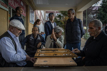 Men play backgammon at a school in the city of Barda that has been turned in to a shelter for people who have been displaced by fighting in the frontline towns and villages around Terter and Agdam.