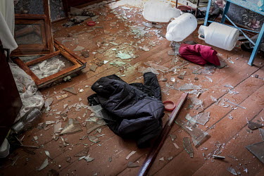 The destroyed interior of a family home where Fuad Ismayilov (31) was killed moments earlier in an Armenian rocket strike.