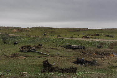A destroyed Armenian tank on the side of a road in Fuzuli, a region of Azerbaijan occupied by Armenia in 1988 which was recaptured by the Azeris during the 2020 Nagorno-Karabakh war.
