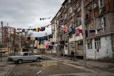 Washing hangs out to dry outside an old university dormitory building in Sumgait, just outside Baku. The buildings have been used to house hundreds of refugee families from Nagorno Karabakh who fled t...