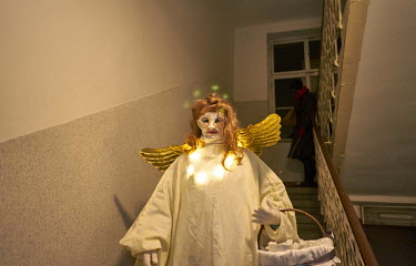 A woman dressed as an angel during the Mikulas (St. Nicholas) celebration. St. Nicholas is a long Czech tradition, celebrated on 5 December, when the trio of St. Nicholas, the Angel and the Devil wand...
