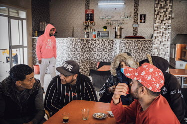 Unemployed young people in a neighbourhood cafe.   It is 10 years since President Ben Ali fled the country on 14 January 2011 after weeks of protests in what is often referred to as the beginning of t...