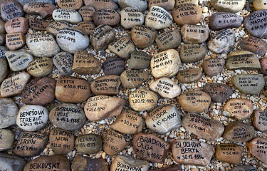 Stones displayed in the garden of the Old Synagoge, each has the name of a Pilsen Jew, murdered during the Holocaust, written on it.