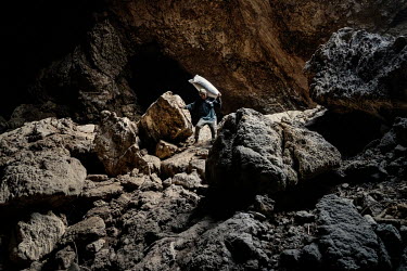 Villagers collect bat droppings, which they sell as fertiliser, at the Khao Chong Pran Cave.A team of researchers consisting of scientists, ecologists, and officers from Thailand's National Park Depar...
