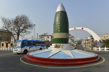 The August 23 Artillery Battle Victory Monument (with the Victory Gate behind) in the centre of a roundabout on Xiao (Little) Kinmen Island commemorating the Second Taiwan Strait Crisis (23 August â�...