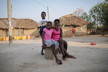 Helina Korley (20) with neighbours in the small village of Midie on the edge of the 'Yomo', the area traditionally held to be the spiritual heart of the salt-rich Songor Lagoon. A fashion design stude...