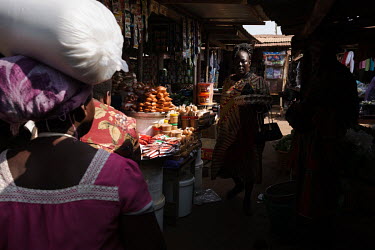 Mary Akuteye at the market in Kasseh. The market serves the surrounding region, including the communities around the salt-rich Songor Lagoon, such as the village of Bonneykope where Akuteye lives. She...
